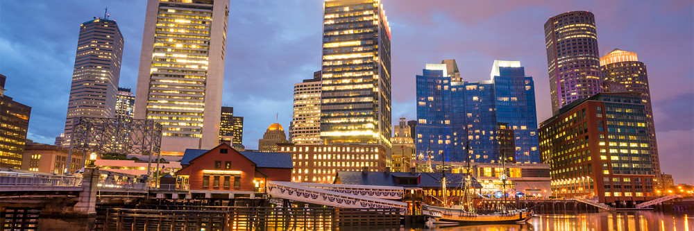 Boston Harbor and Financial District at twilight and Tea Party Ships & Museum in Boston, Massachusetts.; Shutterstock ID 196007507; name: Kristen Kimmel; Client: IHG; Publication: IHG Americas Destinations; Story ID: 78186