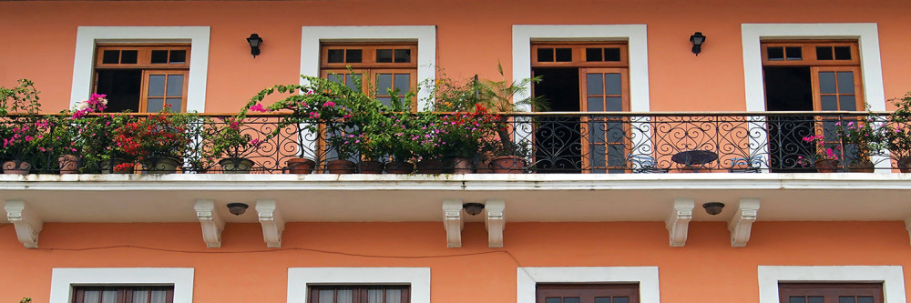 Detail of a colonial house. balcony with flowers and plants, Casco Viejo, Panama City, Panama; Shutterstock ID 138260855; name: Chelsie Rohlen; Client: IHG; Publication: IHG Americas Destinations; Story ID: 76558